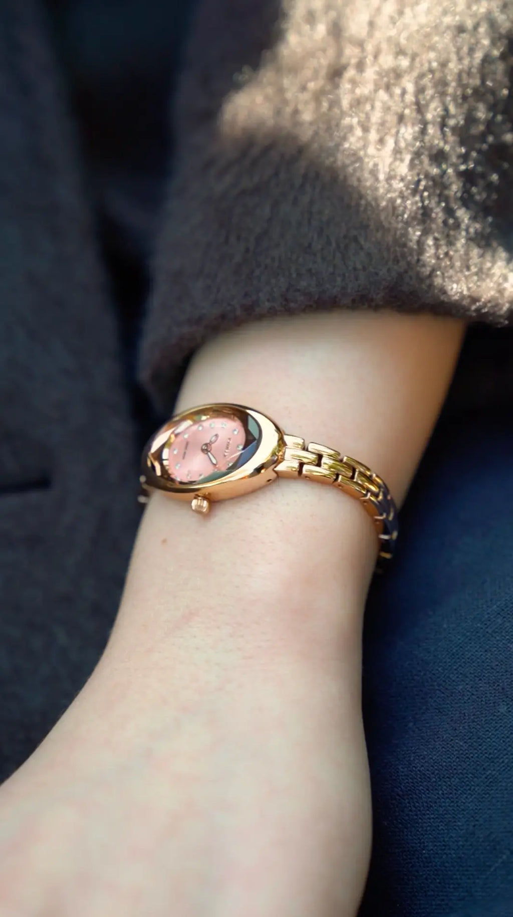Close up of Jowissa Facet Oval Petite Swiss Women's Dress Watch, very small size with rose gold case, dial and bracelet.