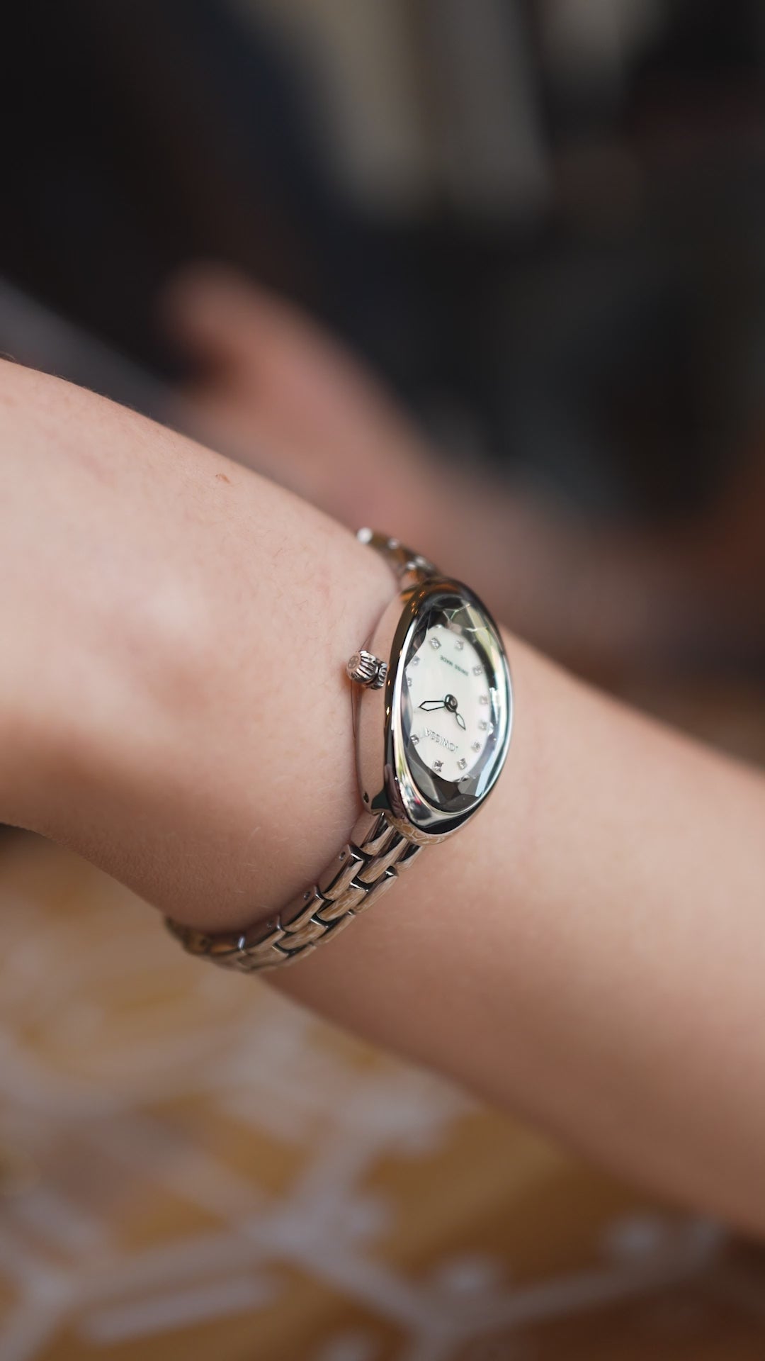 Facet Oval petite watch for ladies with gold strap and white dial - all swiss made watch for women